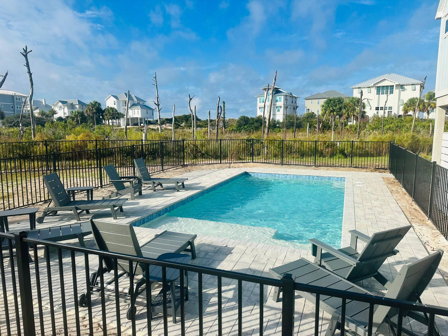 Latitude 30 private pool deck with lounge chairs